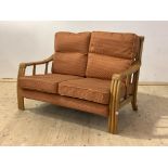 Angraves of Thurmiston, A late 20th century bamboo two seat veranda sofa with upholstered squab
