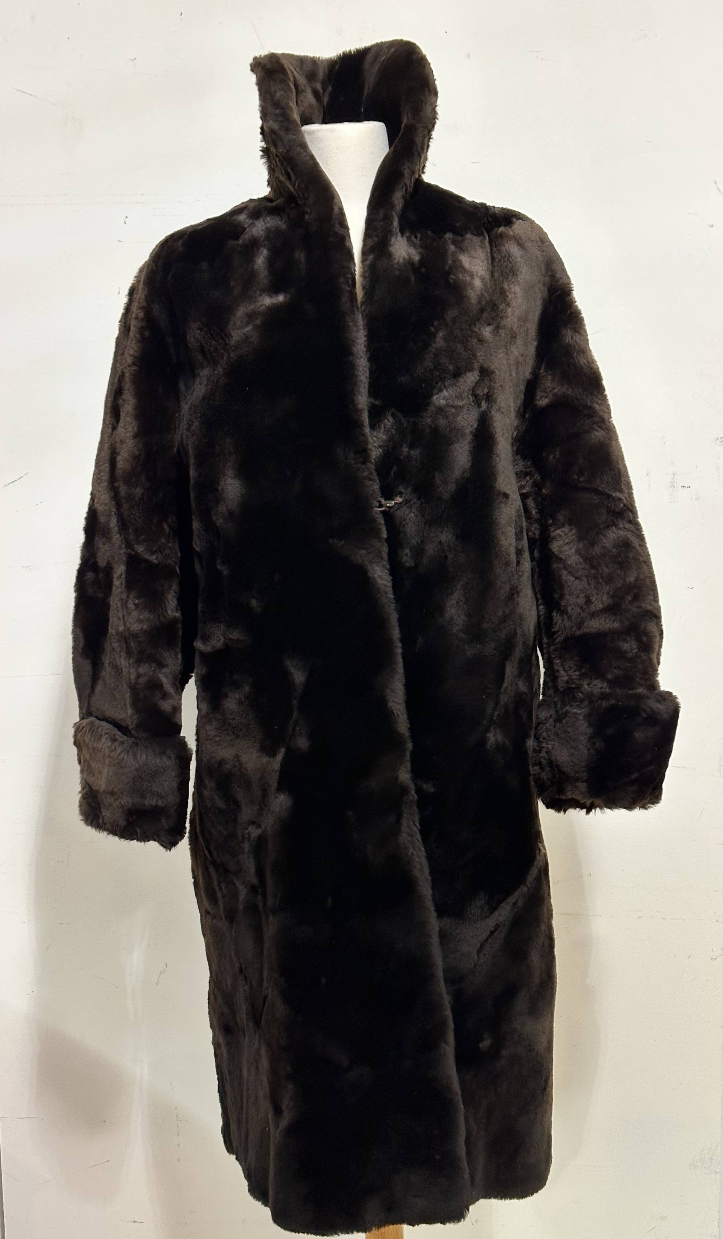 A Beaver Lamb lady's fur coat circa 1930, with cowl neck and rolled cuffs, satinised lining