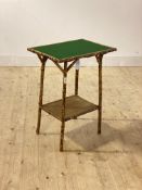A late 19th century bamboo card table, the baize lined top over splayed supports united by an