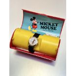 A Bradley Time Walt Disney Productions Mickey Mouse wristwatch with enamelled dial, complete with