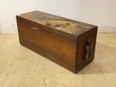 A late 19th century stained varnished walnut coffer, the hinged top over waxed rope carry handle