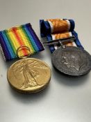 A WWII General Service medal, presented to Private T Coates MGC, complete with ribbons, reference