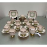 A Plant Tuscan china part tea service pattern no 780956 with a pale pink underglaze and green and