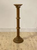 A turned fluted beech torchere, H98cm