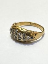 An 18ct gold ring set fifteen various rose cut diamonds, size I, weighs 3.6g