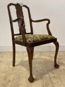 An early 20th century Georgian style mahogany carver chair, with shell carved crest rail over