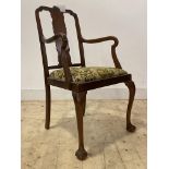 An early 20th century Georgian style mahogany carver chair, with shell carved crest rail over