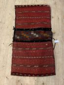 A Persian hand knotted flat weave saddle bag, 118cm x 60cm