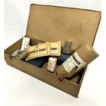 A WWI officers military first aid kit including Boots triangular grey bandage, bandages, fine