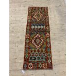 A Chobi kilim runner rug of all over geometric design, 195cm x 65cm