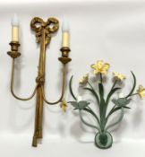 A gilt wood ribbon topped twin branch wall applique with tassels to base, (60cm x 28cm) and a