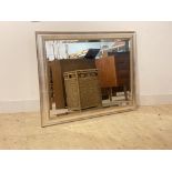 A silvered and gilt framed wall mirror with bevel edge 92cm x 118cm