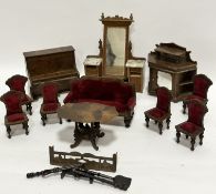 A Victorian style plywood part suite of doll's house furniture including a Duchess style dressing