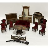 A Victorian style plywood part suite of doll's house furniture including a Duchess style dressing