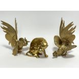 A pair of brass fighting cock table ornaments (20cm x 14cm) and a cast brass seated cat licking