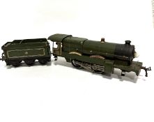 A Hornby series by Meccano GWR engine, Caerphilly Castle complete with tender, in green and gold