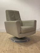 A Contemporary cream leather upholstered swivel lounge armchair, H100cm, W74cm, D80cm