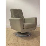 A Contemporary cream leather upholstered swivel lounge armchair, H100cm, W74cm, D80cm