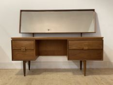 Kofod Larson for G-Plan, A Danish mid century teak dressing table, with swing mirror over base