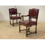 A Pair of circa 1930's oak carver chars, with studded leather upholstered seat and back, scrolled