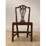A George III elm Hepplewhite style country chair, circa 1800, the shaped crest rail over pierced