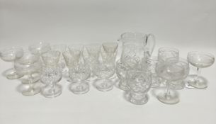 A set of eight Stuart Crystal stemmed glasses, (11.5cm), three Stuart Crystal brandy glasses, a