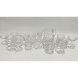 A set of eight Stuart Crystal stemmed glasses, (11.5cm), three Stuart Crystal brandy glasses, a