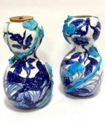 A pair of ceramic double gourd shaped china vases in the Minton style, with handpainted bird and