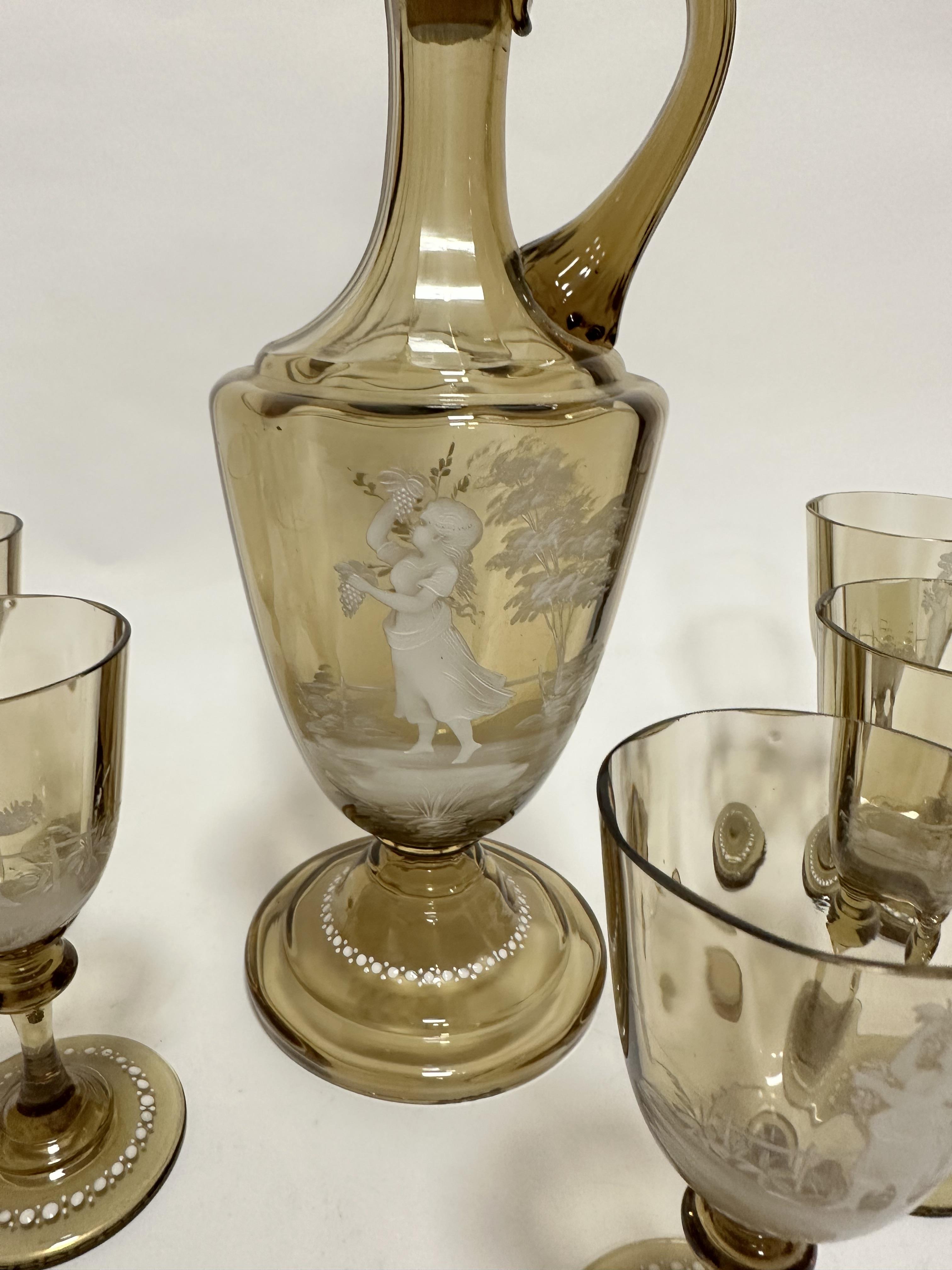 A 19thc pale amber decanter and set of six panelled glasses with Mary Gregory enamelled - Image 2 of 3