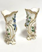 A pair of Royal Crown Derby cornucopia shaped porcelain vases decorated with floral encrusted sprays
