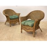 A pair of Vintage wicker verandah armchairs, each with squab cushion, H83cm, W84cm, D66cm