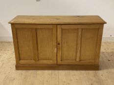 A Victorian and later pine side cabinet, the twin doors enclosing a shelf, on skirted base, H85cm,