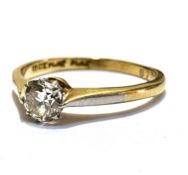 An 18ct gold and platinum set solitaire brilliant cut diamond ring mounted in claw setting,