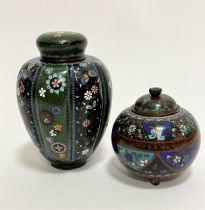 A Chinese white metal Cloisonne tapered tea caddy complete with inner lid and cover, decorated
