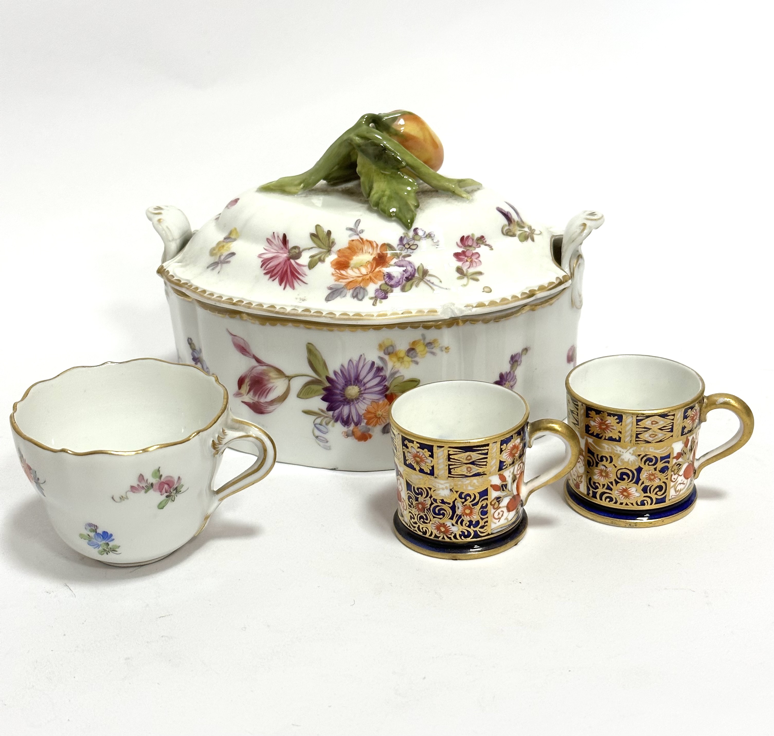 A German porcelain shaped tureen with floral knop and hand decorated floral sprays with lug