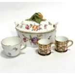 A German porcelain shaped tureen with floral knop and hand decorated floral sprays with lug