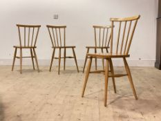 A Set of four light beech and plywood Ercol style comb back dining chairs, H81cm, W38cm, D36cm