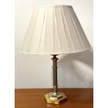 A brass and brushed steel finish octagonal column table lamp on brass mounted base complete with
