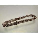 A 9ct gold fancy chain link bracelet complete with safety catch fastening, (18cm x 8mm) (8.9g)