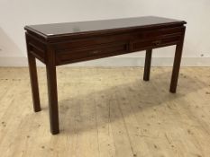 A Chinese style hardwood hall table, fitted with two frieze drawers, raised on square moulded