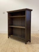 An early 20th century oak open bookcase with two adjustable shelves, H99cm, W92cm, D31cm