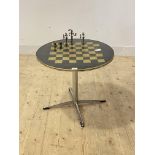 A Vintage chess table, the painted brass circular top raised on a chrome four point base, (H52cm,