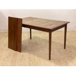 Nils Jonssen for Troeds, a Swedish mid century teak extending dining table, the shaped rectangular