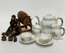 An Edwardian china seven piece doll style teaset complete with teapot (missing knop), milk jug,