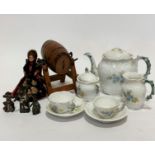 An Edwardian china seven piece doll style teaset complete with teapot (missing knop), milk jug,