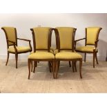 A set of eight (6+2) stained beech framed Regency style dining chairs, the scrolled uprights over