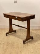 A Victorian mahogany library table, the rectangular top fitted with a drawer, raised on panel end