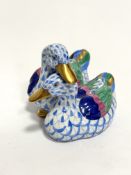 A Hungarian Herend porcelain figure group of two ducks decorated with blue design, (7.5cm x 10cm x