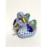 A Hungarian Herend porcelain figure group of two ducks decorated with blue design, (7.5cm x 10cm x