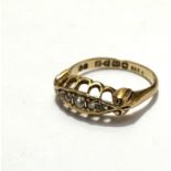 An 18ct gold five stone old mixed cut diamond ring mounted in channel setting, size K, weighs 2.5g